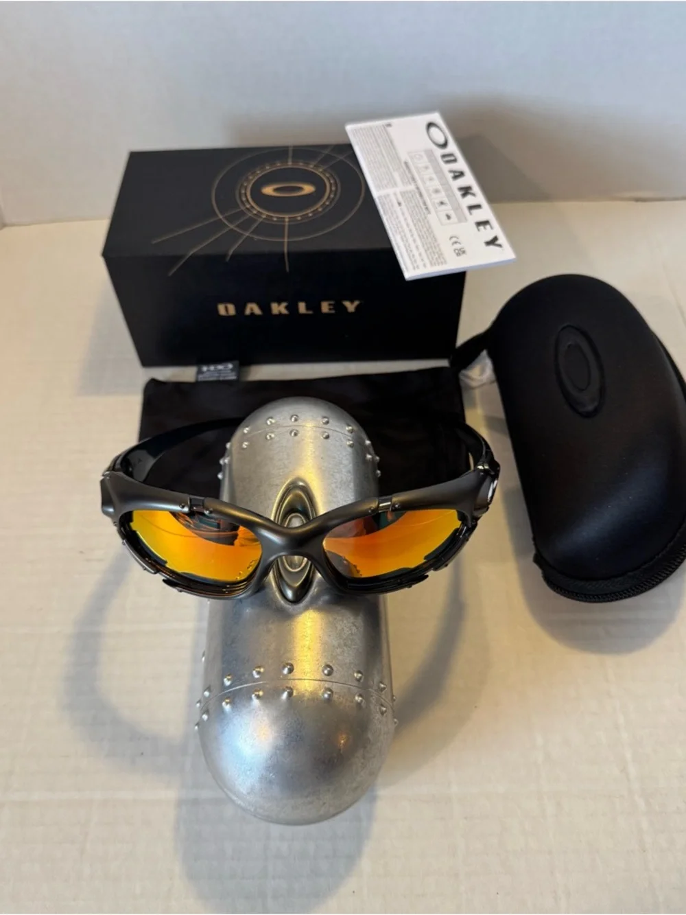 Oakley Black Sunglasses with Orange Mirror Lenses